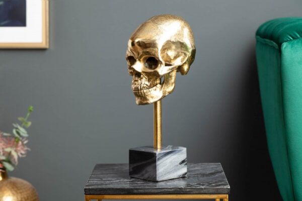 Skulptura lubanje zlato